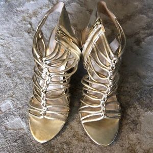Vince Camuto gold gladiator heeled sandals, leather upper, size 9, 4” heel.